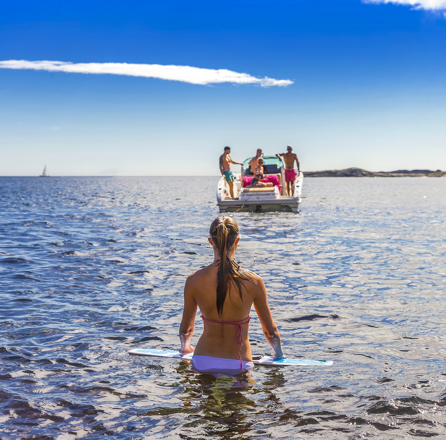 girl standing with subwing in water 