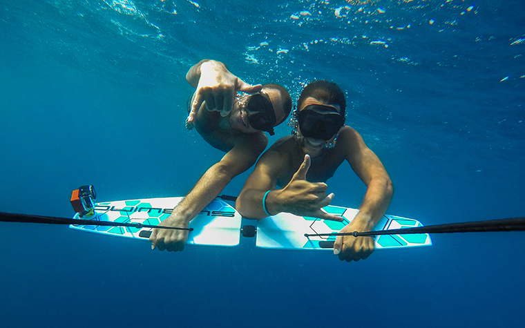 two friends havin fun on one subwing