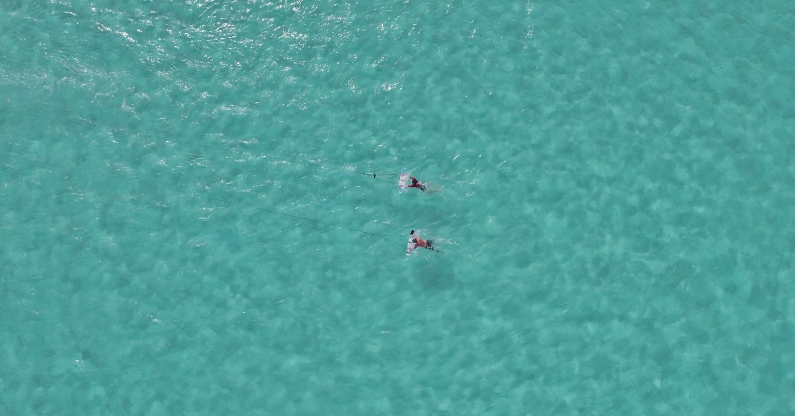 high altitude drone shot of subwing in caribbean