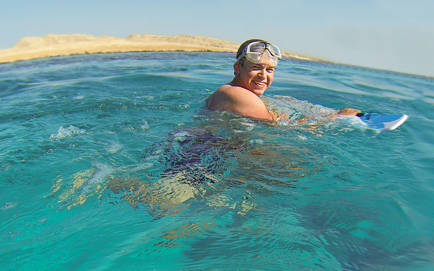 smiling subwing rider on water surface