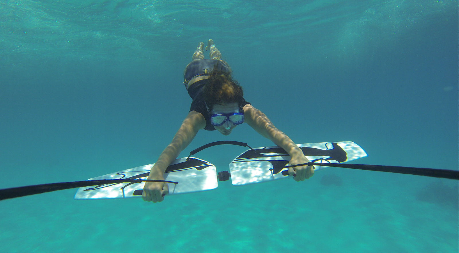 Girl front view diving with subwing