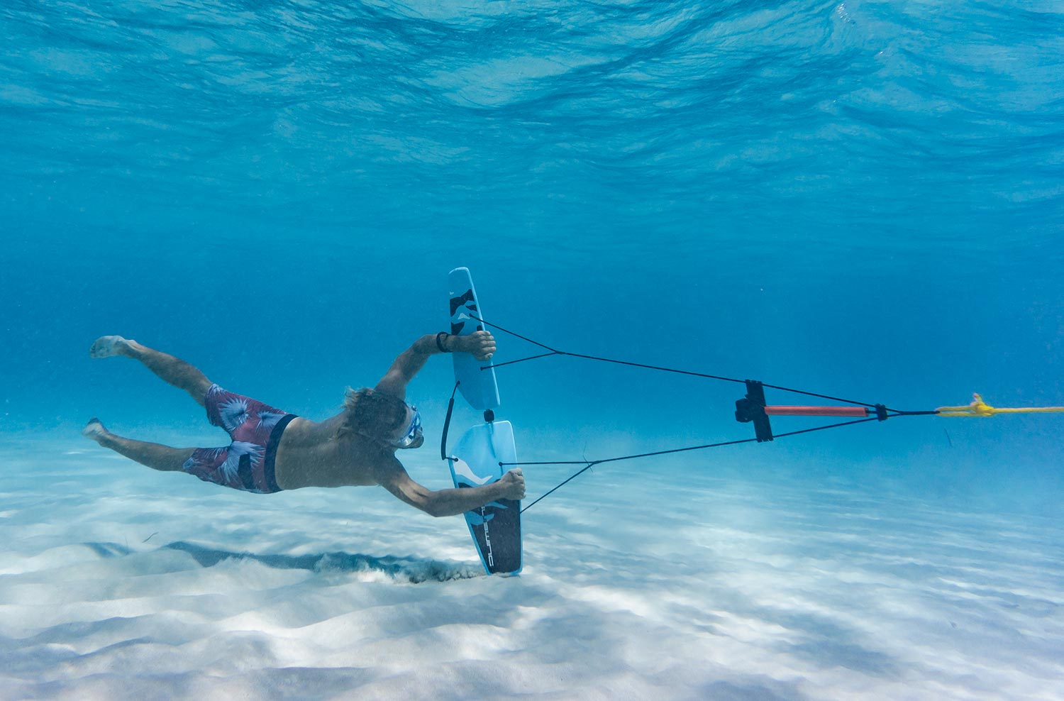subwing making sand trail with wing tip