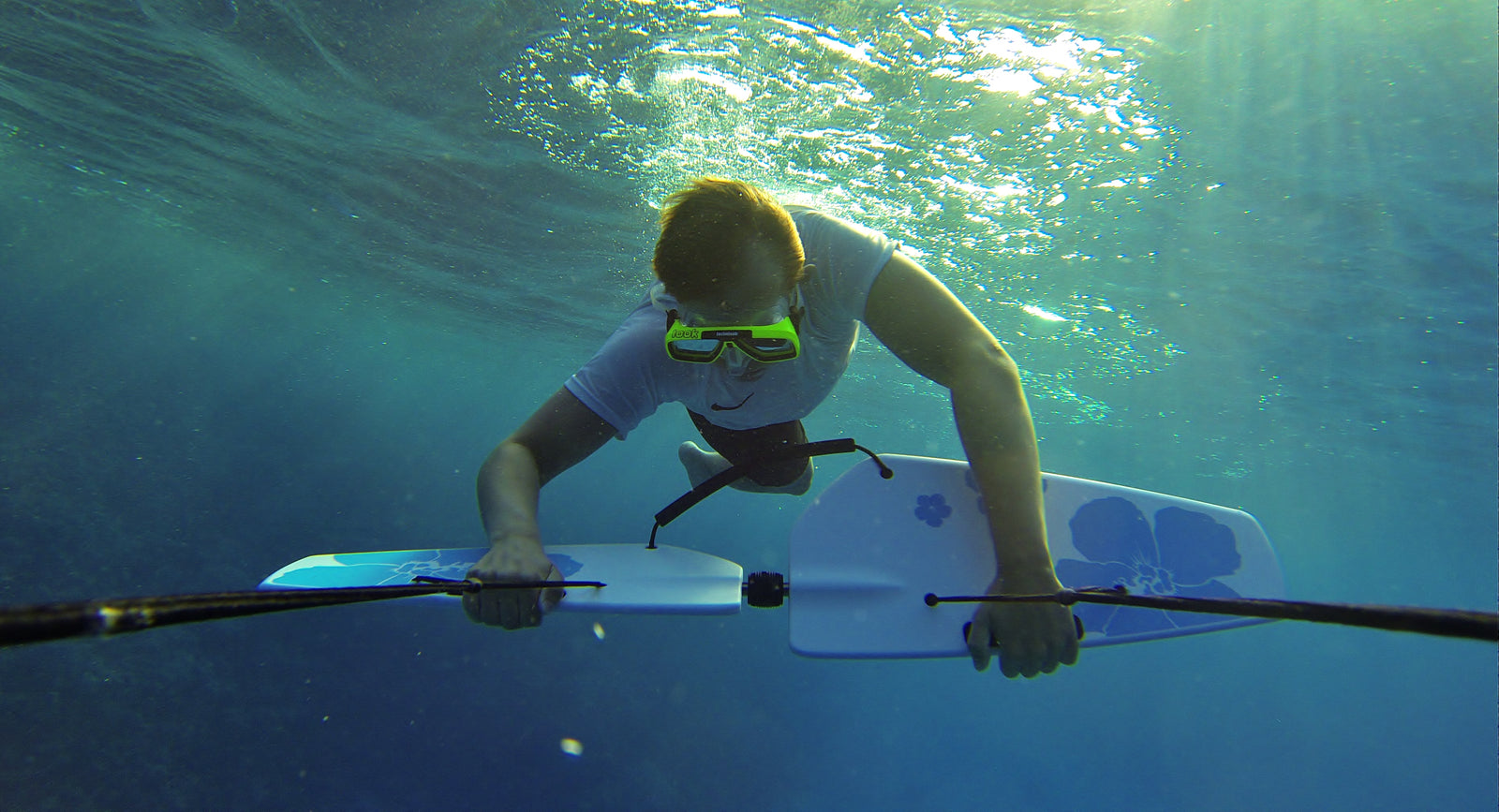 Subwing spin trick in underwater sunrays